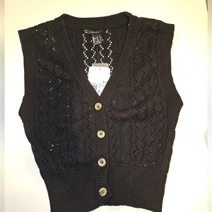 Black sweater vest